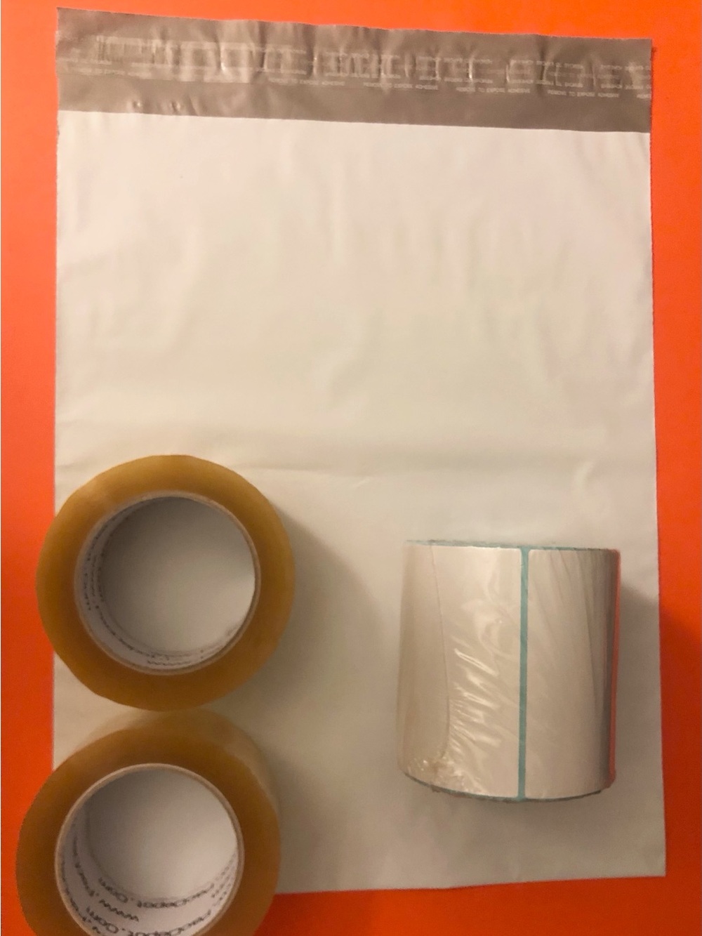 Durable White Poly Mailer with Clear Tape and Adhesive Labels - White